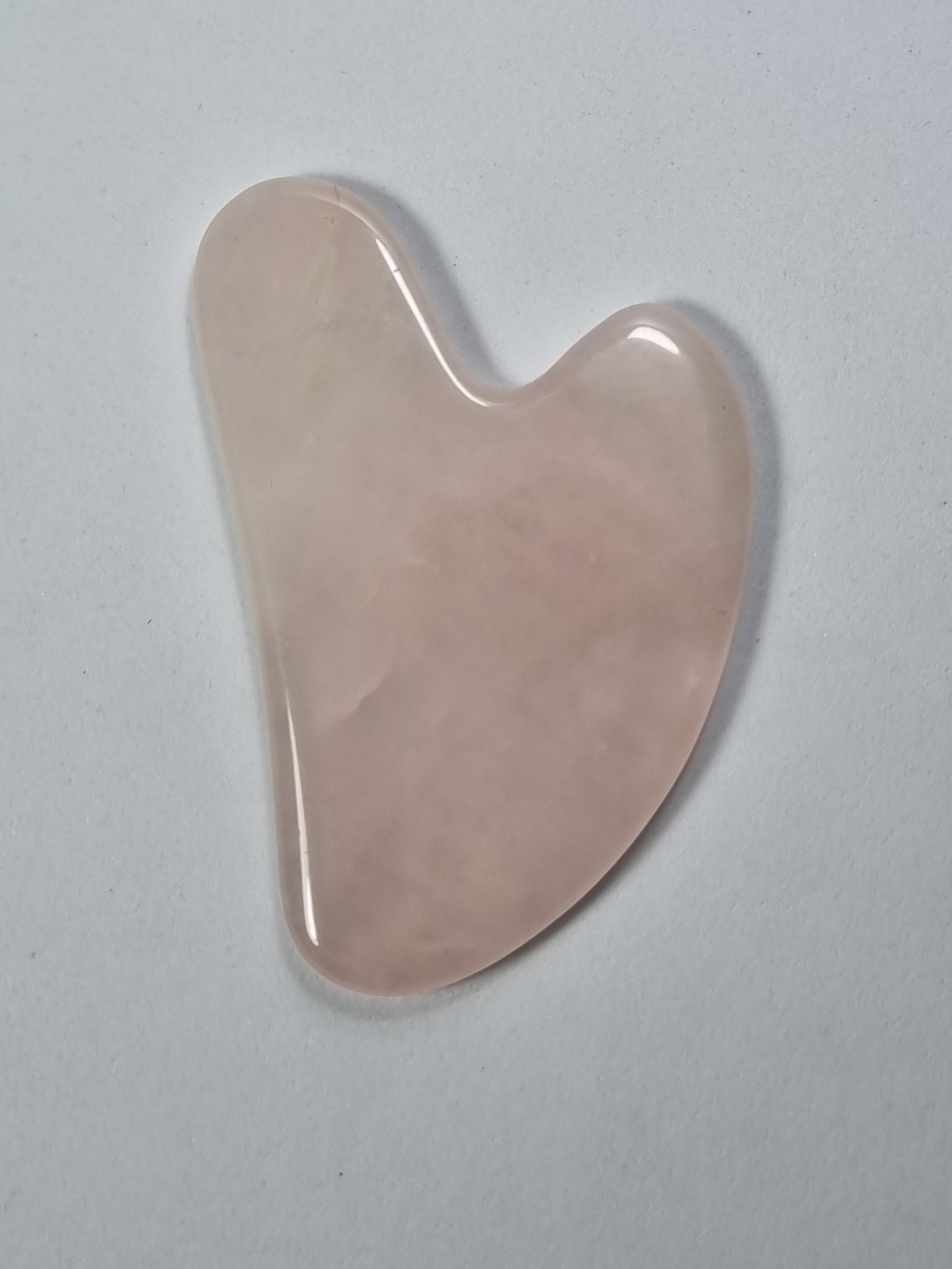 Tabla de Cuarzo Rosa facial Gua Sha